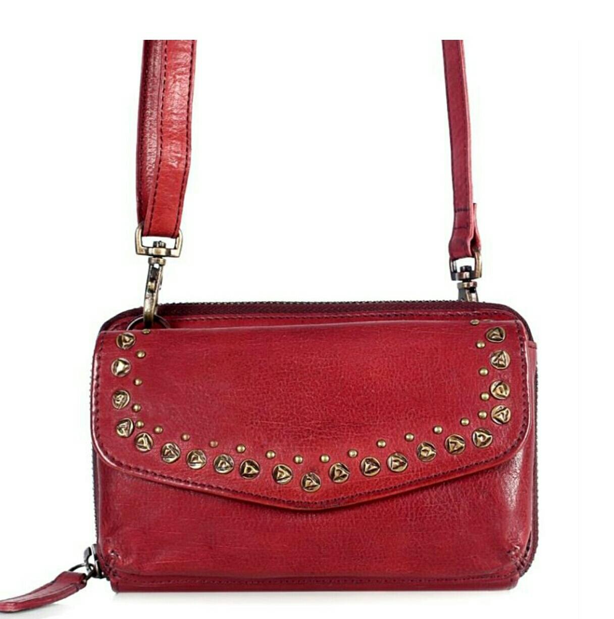 vegetable tanned genuine leather bag to add glamour