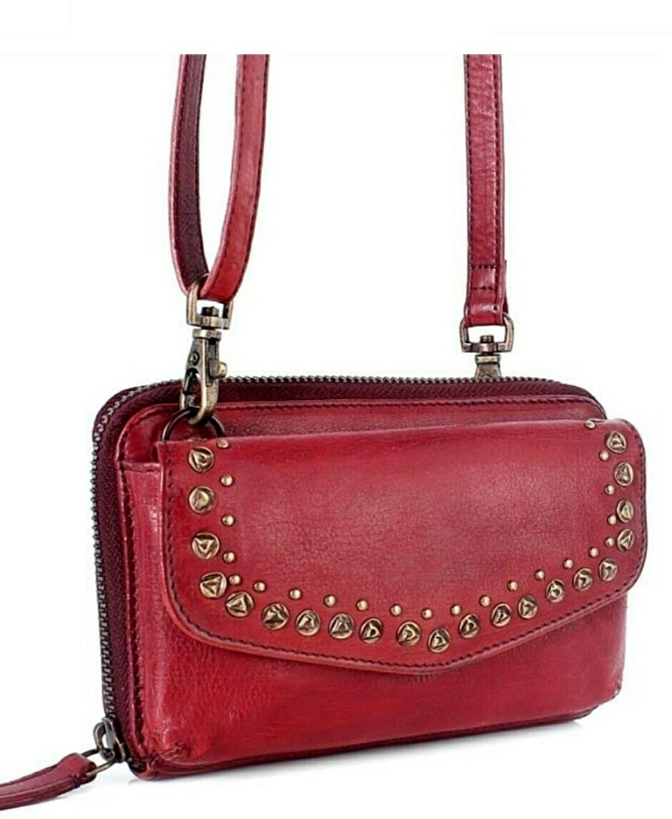 vegetable tanned genuine leather bag to add glamour